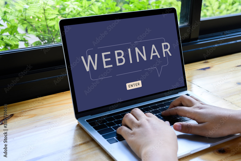 Person using a laptop computer for online training webinars. E-learning browsing connection and cloud online technology webcast concept. Laptop mockup with clipping path on screen Person using a laptop computer for online training webinars. E-learning browsing connection and cloud online technology webcast concept. Laptop mockup with clipping path on screen