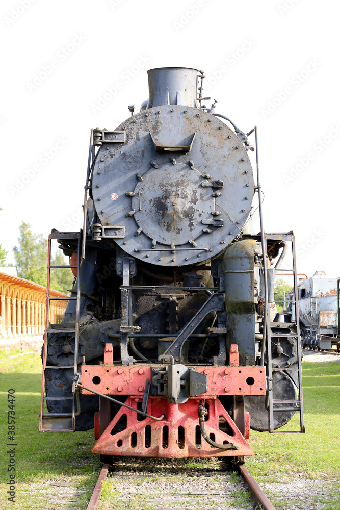 Naklejka premium An old locomotive of a steam train in Estonia