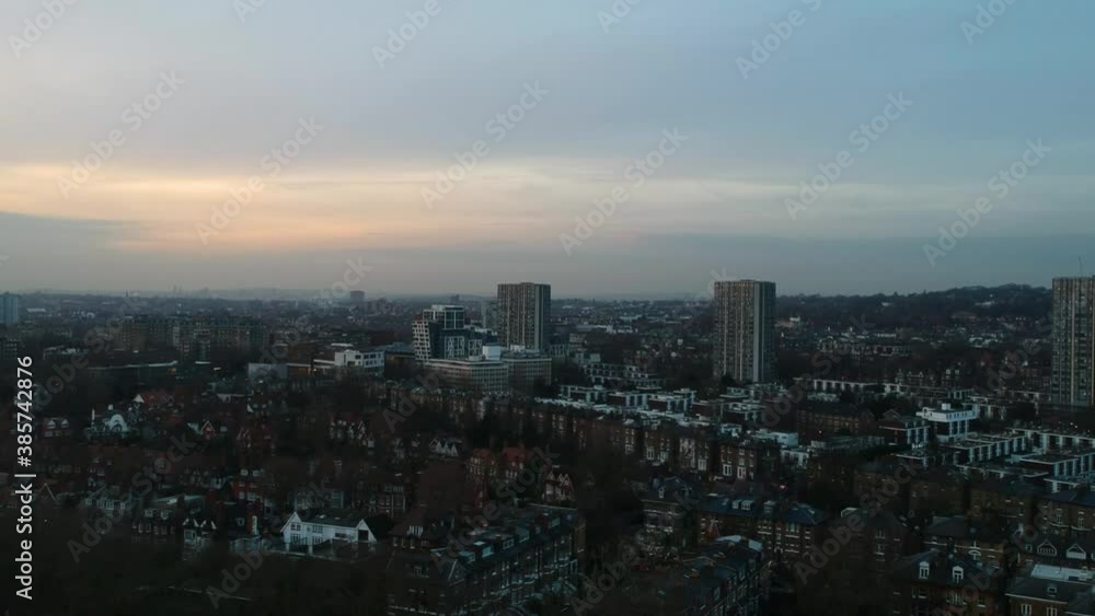 High above panning drone shot of overcast London skyline High above panning drone shot of overcast London skyline