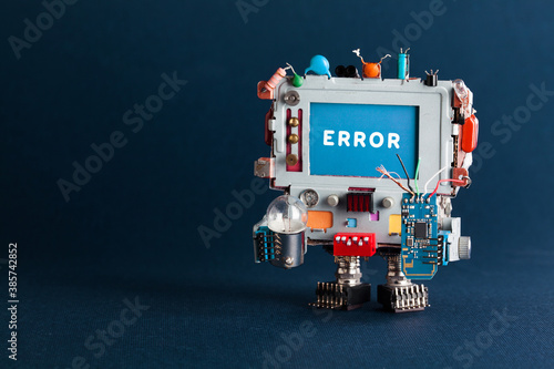 Error concept poster. Toy robotic computer with light bulb and broken circuit on dark blue background. Text message Error on blue screen. Copy space.