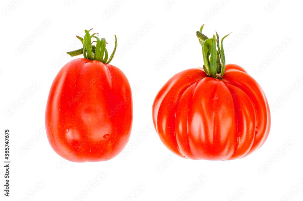 Big pink beef tomato isolated on white background. Big pink beef tomato isolated on white background.