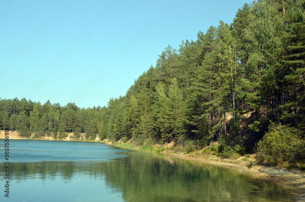 Blue Lake in the Chernigow region, Ukraine.Former quarry of quartz sand for glass production.Popular local resort at present Blue Lake in the Chernigow region, Ukraine.Former quarry of quartz sand for glass production.Popular local resort at present