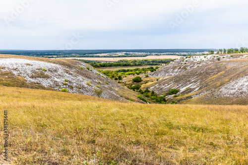 a plateau and open-air museum on the right bank of Don River, a steppe with remains of chalk pillars or limestone outcrops, known for its cave temples. Russia photo