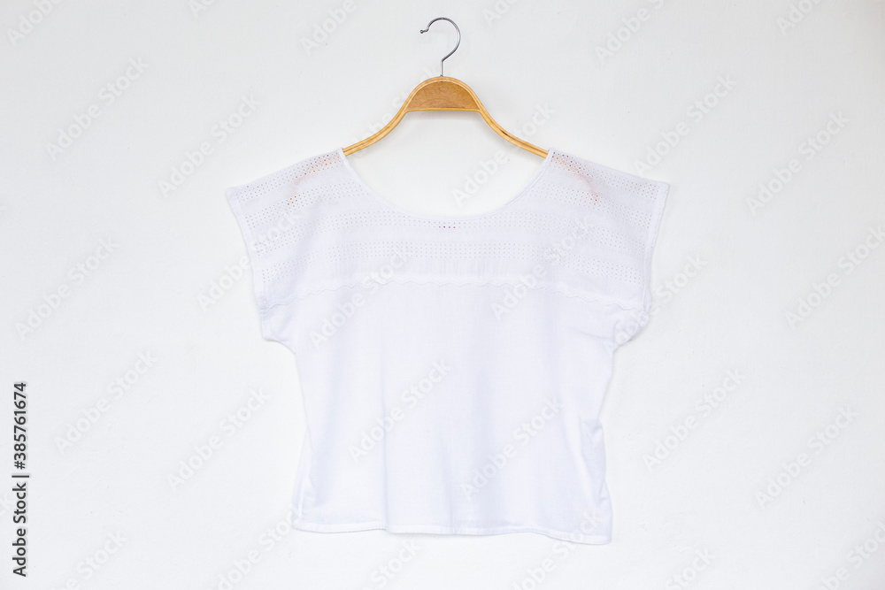 White blouse on white background.minimal style. White blouse on white background.minimal style.