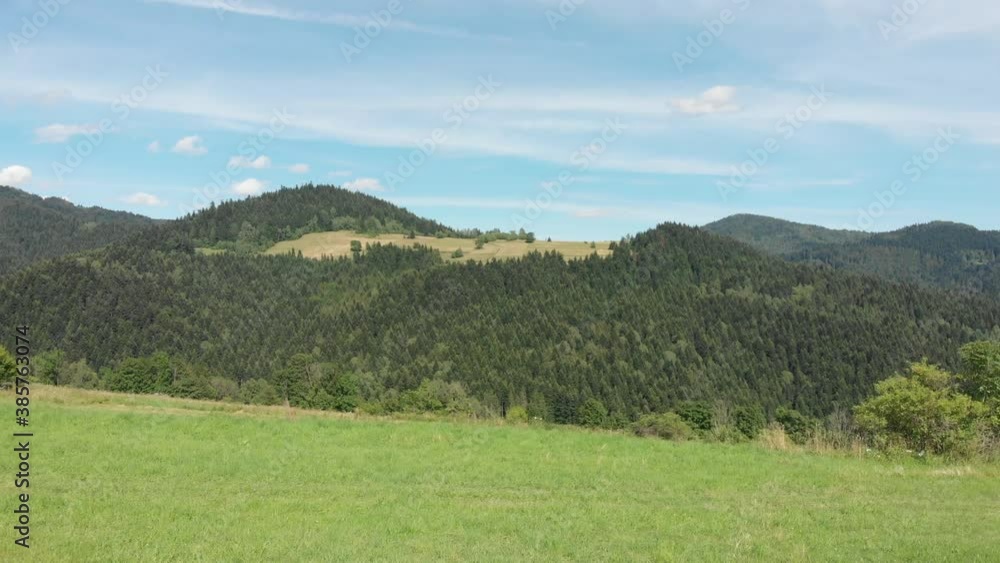 Flying forward to mountain Wierch, near village Lomnica-Zdroj. Beskid Sadecki, Poland. Flying forward to mountain Wierch, near village Lomnica-Zdroj. Beskid Sadecki, Poland.