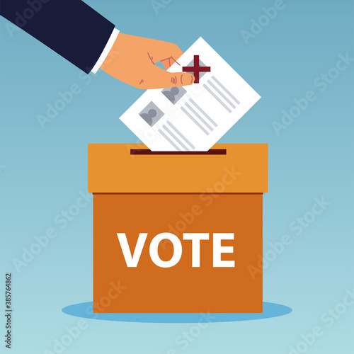 election day, hand pushing ballot in box