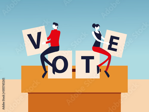 election day, man and woman with vote letters in cardboard box