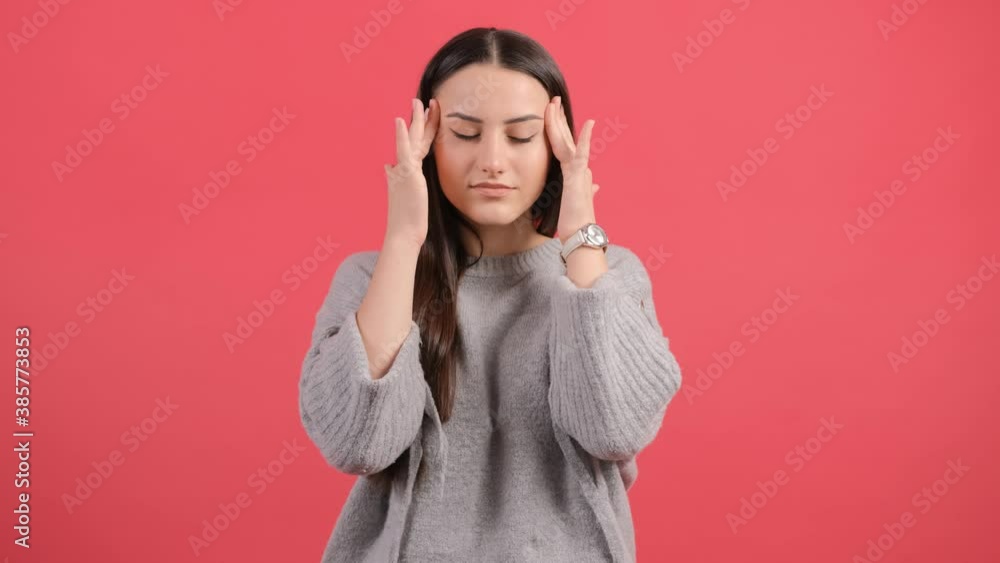 Headache. Close up of an young woman feeling pain, holding her head with hand. Headache. Close up of an young woman feeling pain, holding her head with hand.