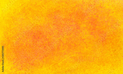 grunge bright abstract yellow orange grainy shabby scratched background. The effect of an old scratched surface. Universal background for banners, brochures, cards, flyers.