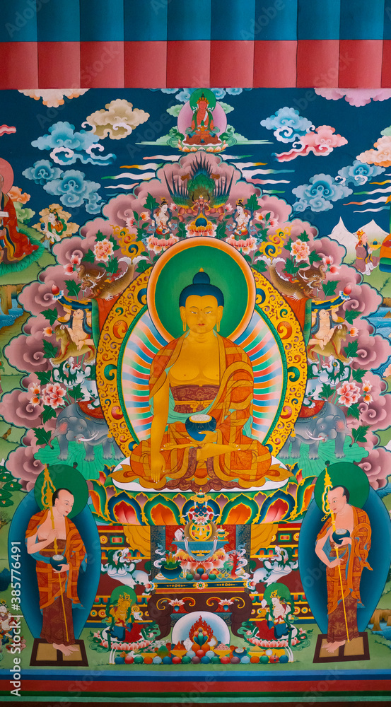 Fototapeta premium CHAME, NEPAL - APRIL 30, 2020: Old buddhist fresco at the gate of Chame village in Annapurna Circuit - most popular tourists trek in Himalayan mountain massive in Nepal on 30 April 2020