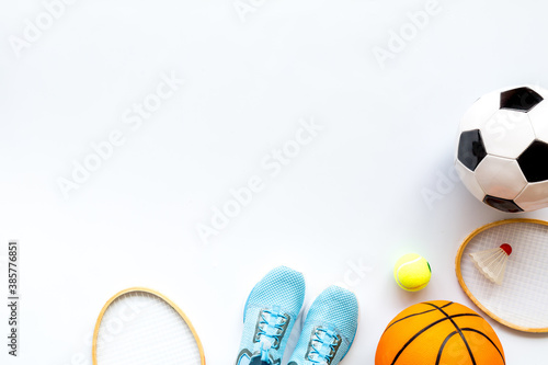 Fototapeta Naklejka Na Ścianę i Meble -  Set of sport games balls on white baclground top view copy space
