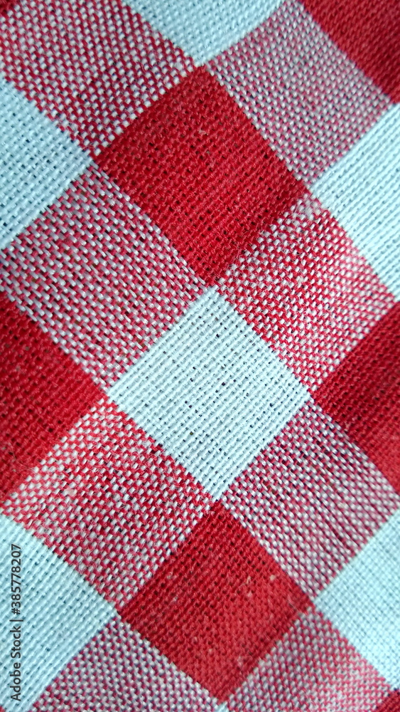 Orange loincloth texture with orange gingham seamless pattern, abstract plaid, Texture background for Loincloth or Thai bathing cloth. Orange loincloth texture with orange gingham seamless pattern, abstract plaid, Texture background for Loincloth or Thai bathing cloth.