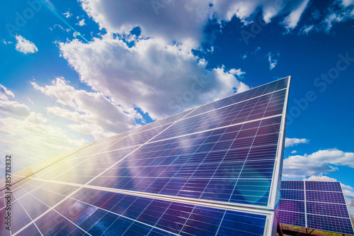 Photography Solar energy panel system, and the sky clouds and sun rays