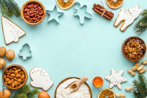 Cooking icing Christmas cookies gingerbread, flat lay, top view