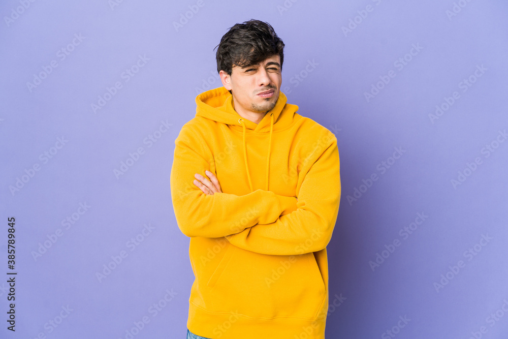 Young cool man unhappy looking in camera with sarcastic expression. Young cool man unhappy looking in camera with sarcastic expression.