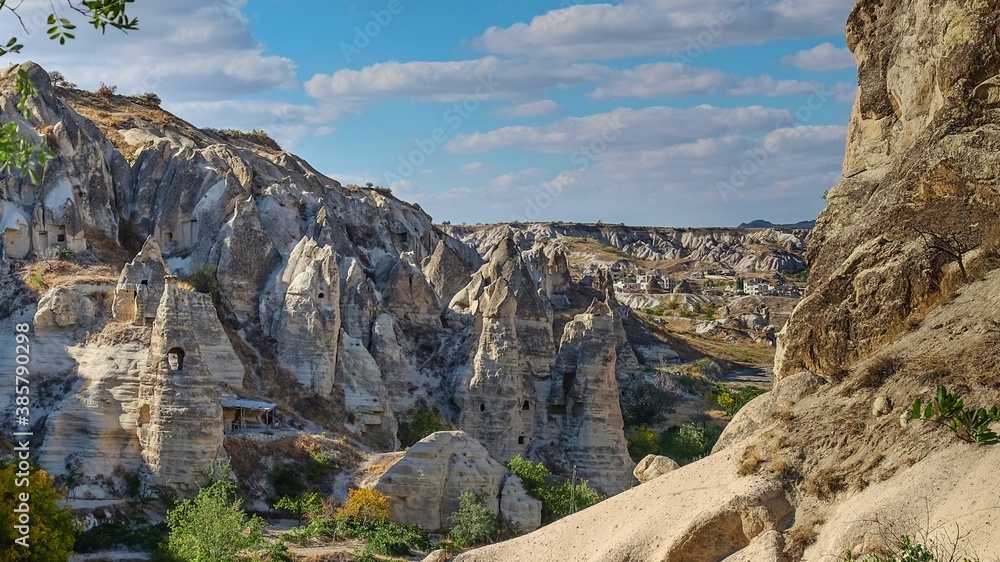 Fabulous natural volcanic tuff formation with cave rock houses in Open-air Museum Goreme,Cappadocia valley,Turkey