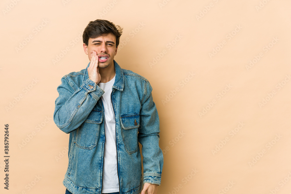 Young cool man having a strong teeth pain, molar ache. Young cool man having a strong teeth pain, molar ache.