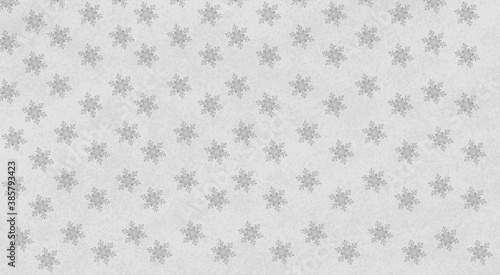  Falling snowflakes on a gray background. Winter style