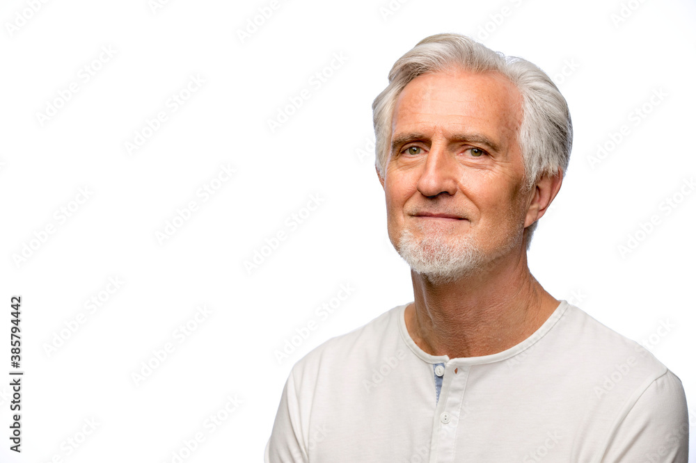 Portrait of middle aged white man with grey hair looking at camera with straight face Portrait of middle aged white man with grey hair looking at camera with straight face
