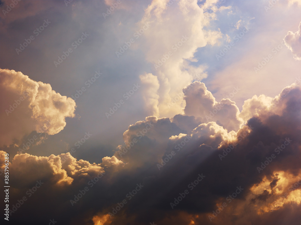 Dramatic sunlight in evening stormy sky Dramatic sunlight in evening stormy sky