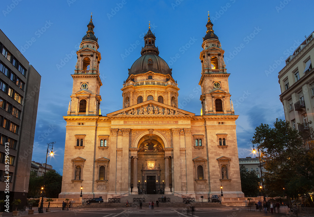 Illuminated St. Stephen's Basilica on St. Stephen's square evening shot in Pest part of Budapest, Hungary