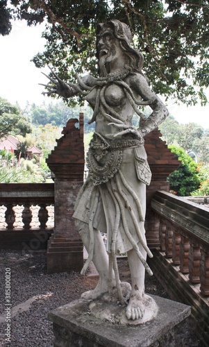 Balinese statue of demon at Titra Gangga, Water Palace in Bali, Indonesia