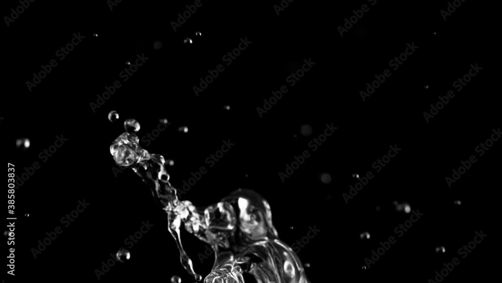 Super slow motion of splashing water, black background. Filmed on high speed cinema camera, 1000fps. Super slow motion of splashing water, black background. Filmed on high speed cinema camera, 1000fps.