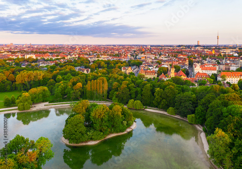 Germany, Bavaria, Munich, Drone view of Kleinhesseloher See and Electors Island in English Garden at dawn photo