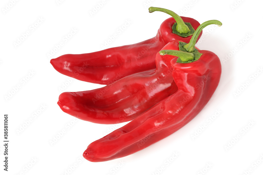 Three long red sweet peppers isolated on white