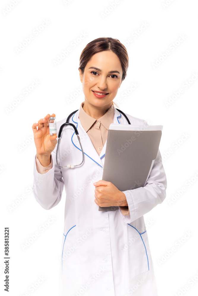 Smiling doctor holding jar of vaccine and paper folder isolated on white