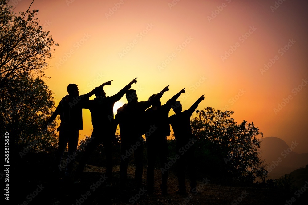 group of people at sunset group of people at sunset
