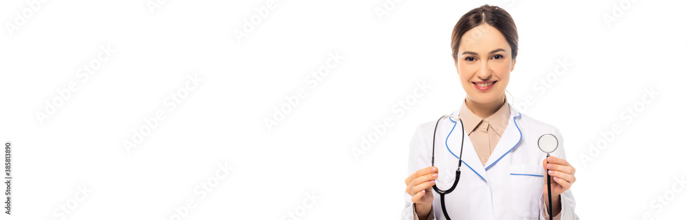 Panoramic shot of doctor in white coat holding stethoscope isolated on white Panoramic shot of doctor in white coat holding stethoscope isolated on white