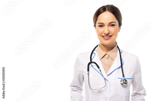 Positive doctor in white coat with stethoscope looking at camera isolated on white