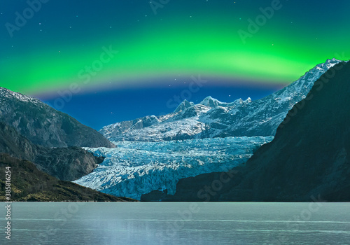 Scenic view of Aurora Borealis over Mendenhall Glacier at night photo