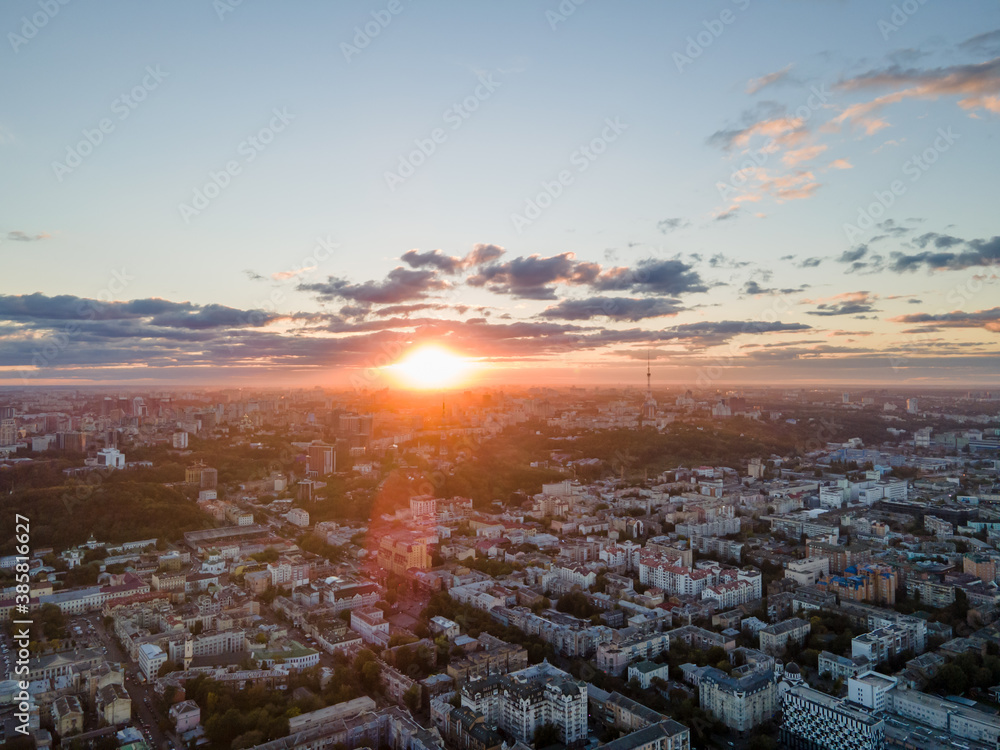 Aerial view of the big city at sunset