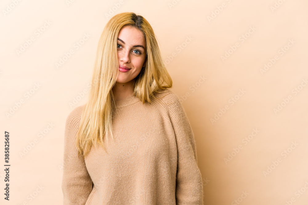 Young blonde caucasian woman happy, smiling and cheerful. Young blonde caucasian woman happy, smiling and cheerful.