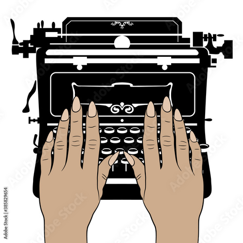 Two female hands with long nails typing on vintage mechanical typewriter. Creative concept.
