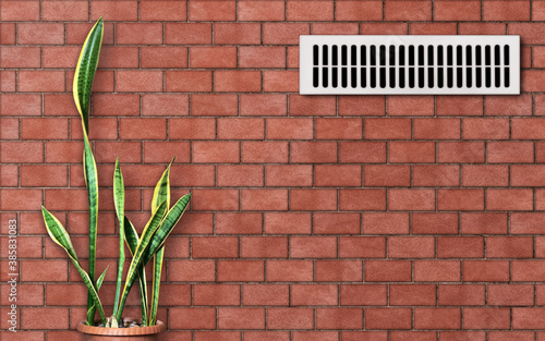 Ventilation grille on a red brick wall. Evergreen plant (Sansevieria)