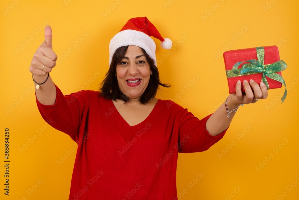 Good job! Portrait of a happy smiling blue eyed young successful woman giving two thumbs up gesture standing indoors. Positive human emotion facial expression body language. Funny girl Good job! Portrait of a happy smiling blue eyed young successful woman giving two thumbs up gesture standing indoors. Positive human emotion facial expression body language. Funny girl