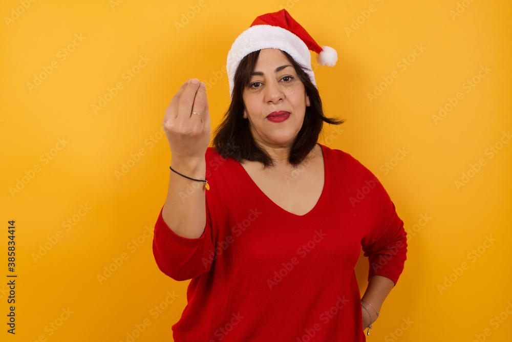 What the hell are you talking about. Shot of frustrated young European woman gesturing with raised hand doing Italian gesture, frowning, being displeased and confused with dumb question. What the hell are you talking about. Shot of frustrated young European woman gesturing with raised hand doing Italian gesture, frowning, being displeased and confused with dumb question.