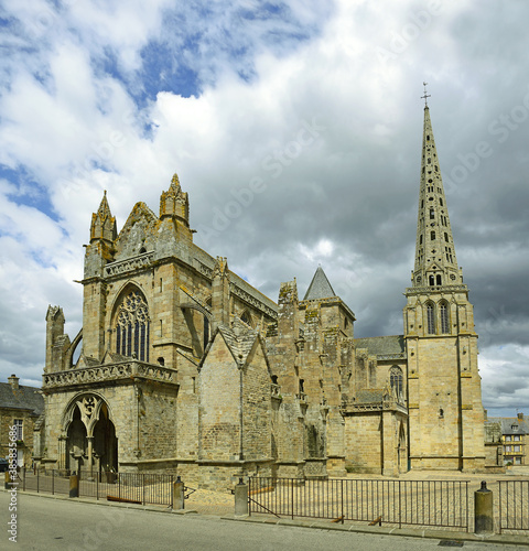 Main square and treguier Cathedral (Cathedrale Saint-Tugdual de Treguier). The Roman Catholic church and former cathedral in Treguier in Brittany, dedicated to Saint Tudwal, France photo