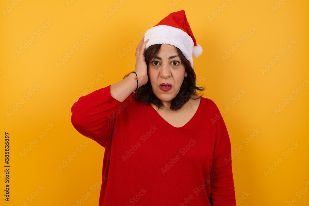 Worried and anxious woman can not remember anything. Portrait of confused cute girl wearing casual clothes, holding hand on hair and frowning, panicking, losing memory over gray wall Worried and anxious woman can not remember anything. Portrait of confused cute girl wearing casual clothes, holding hand on hair and frowning, panicking, losing memory over gray wall
