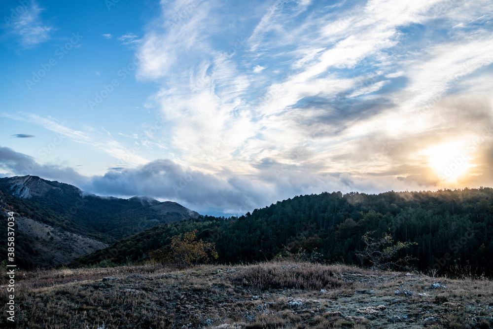 sunrise in the mountains with morning fog from early autumn sunrise in the mountains with morning fog from early autumn