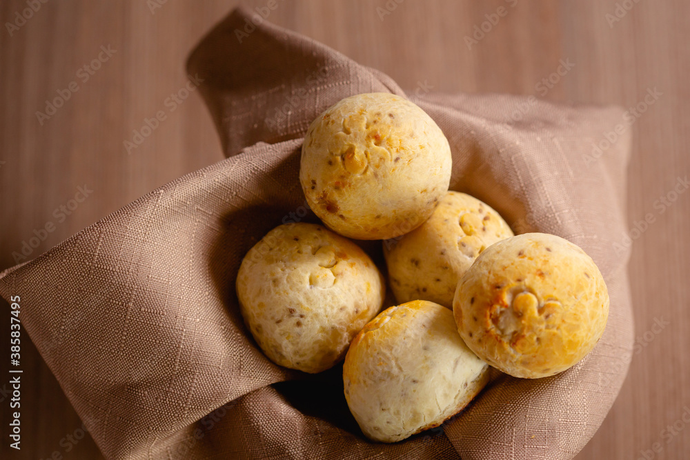 Basket with baked cheese breads for breakfast. Healthy meal from a fitness diet. Basket with baked cheese breads for breakfast. Healthy meal from a fitness diet.