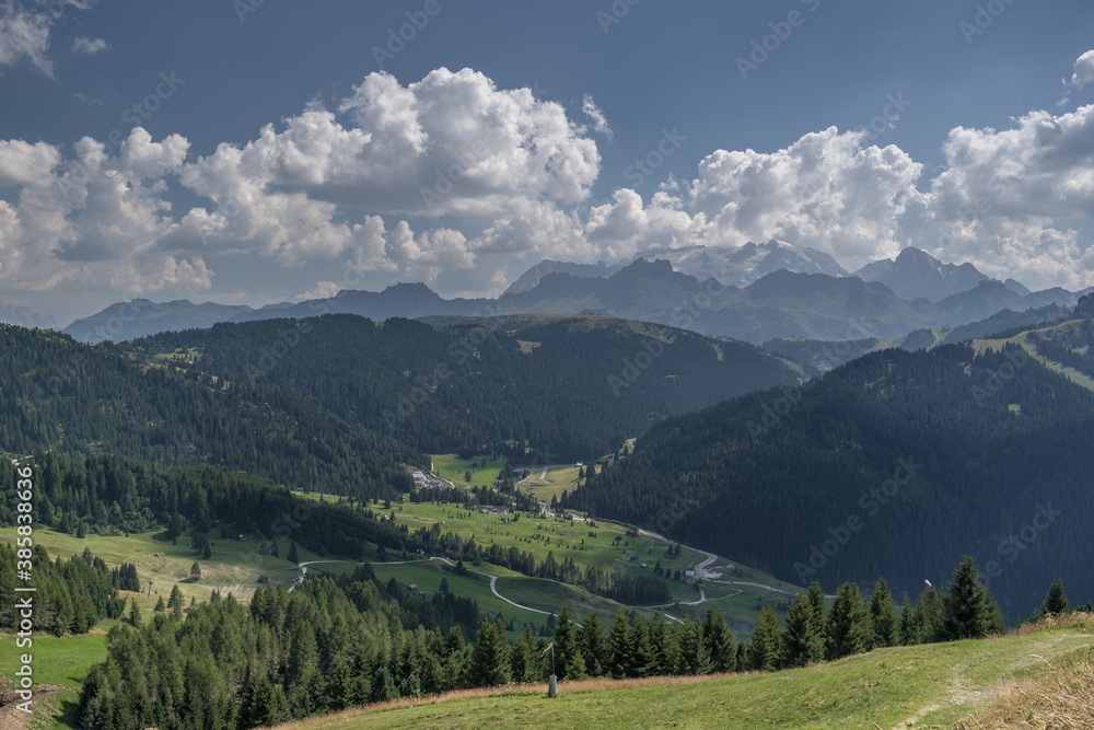 View of the magnificent Dolomite mountains as seen from Piz La Ila plateau above La Villa village in Badia valley, Dolomites, South Tirol, Italy. 