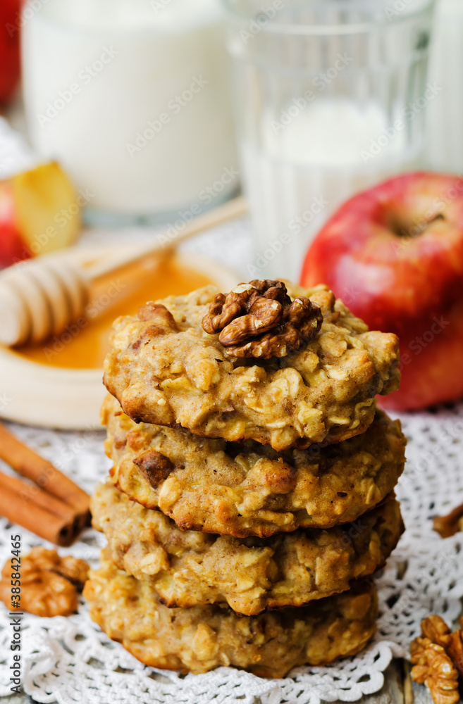 apples oats cinnamon cookies on a wood background apples oats cinnamon cookies on a wood background