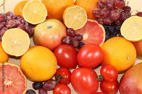 Tropical fruits  grapefruit  apples  grapes  lemon  banner. Detox diet minimal concept flat lay Healthy and natural food concept. Vitamins C  lifestyle