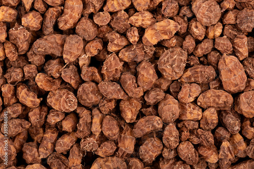 Tigernuts background. Chufa nuts or tiger nuts.