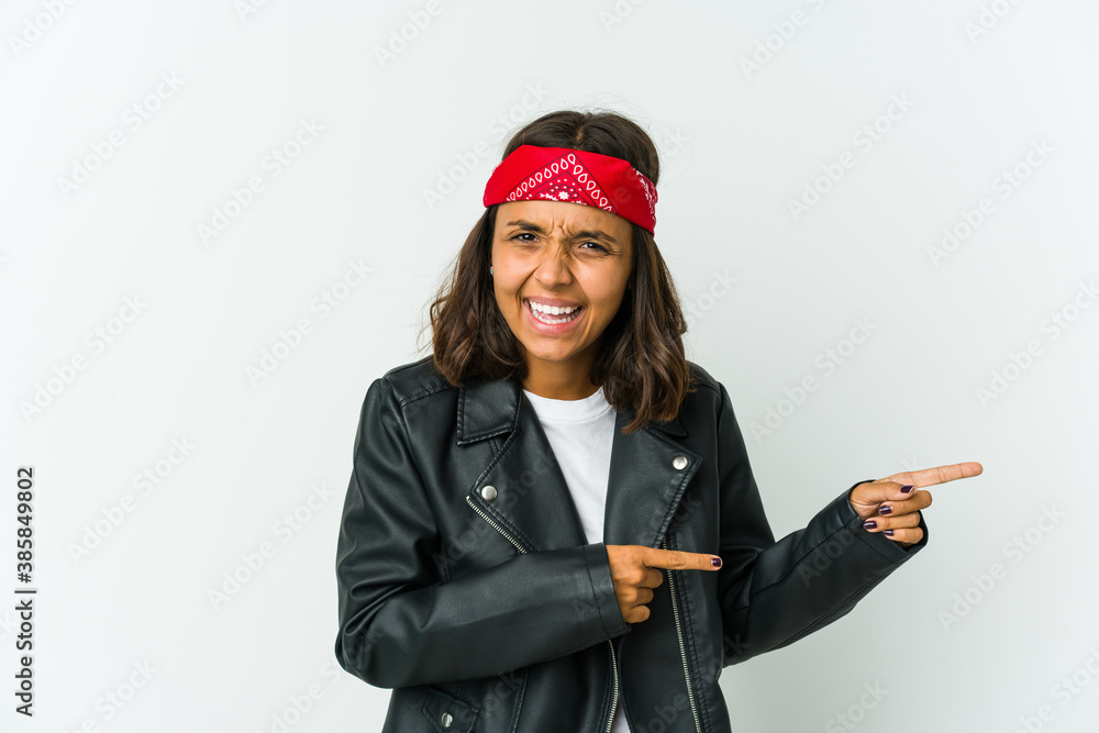 Young latin rocker woman isolated on white background Young latin rocker woman isolated on white background