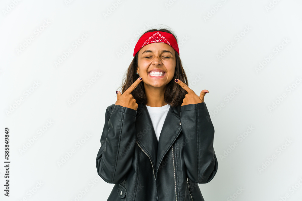 Young latin rocker woman isolated on white background Young latin rocker woman isolated on white background
